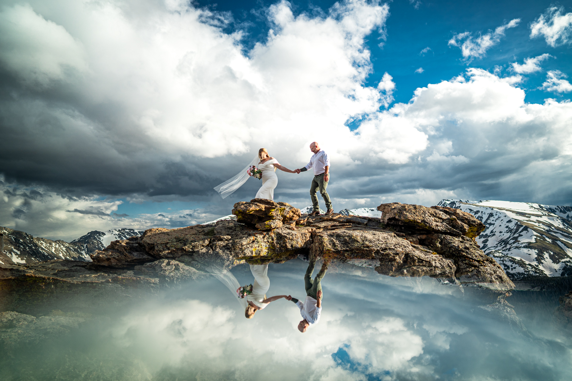 Bride and groom share a golden-hour kiss in Rocky Mountain National Park | Estes Park wedding photographer