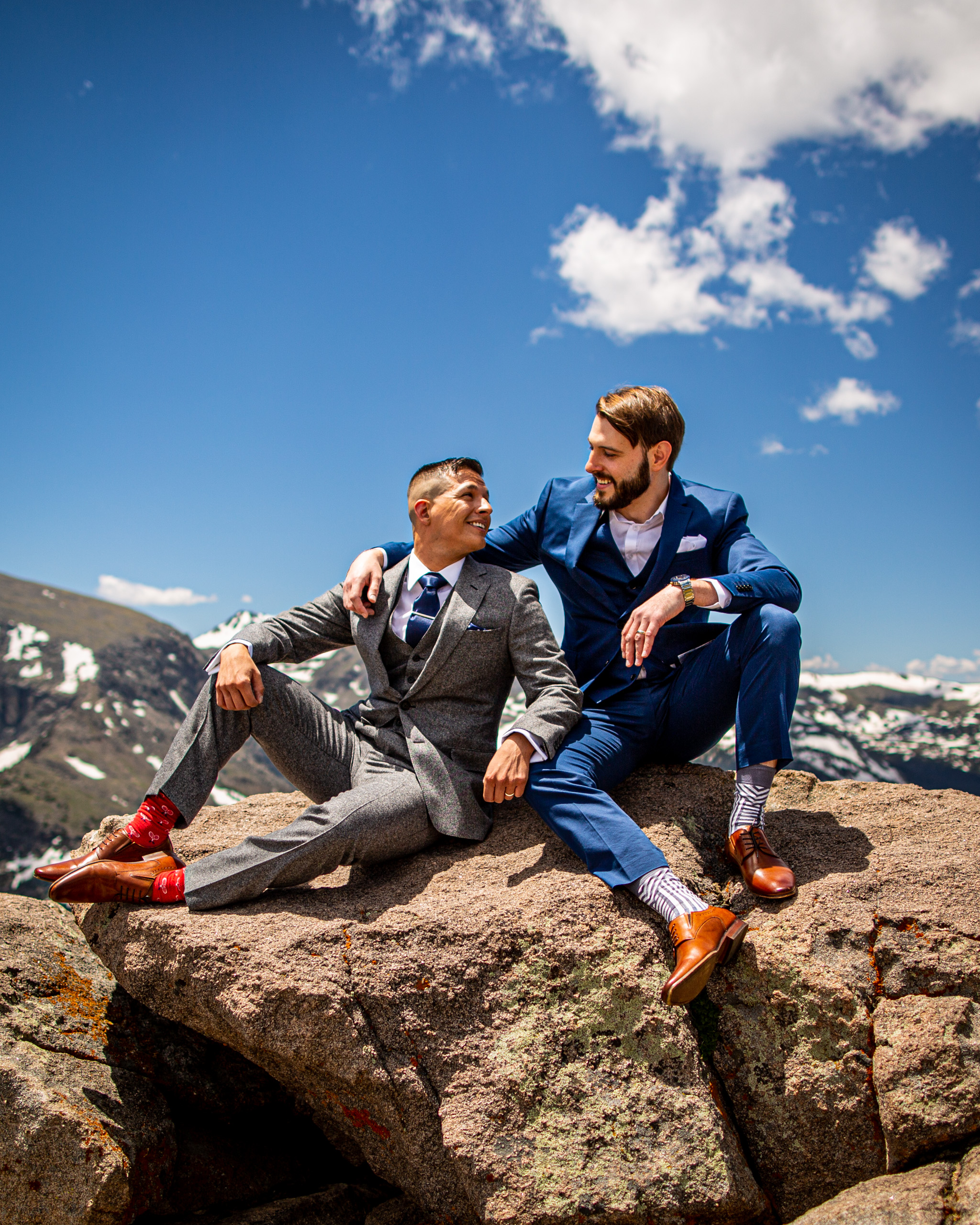 gay men in rmnp newly married gay men sharing a smile in RMNP