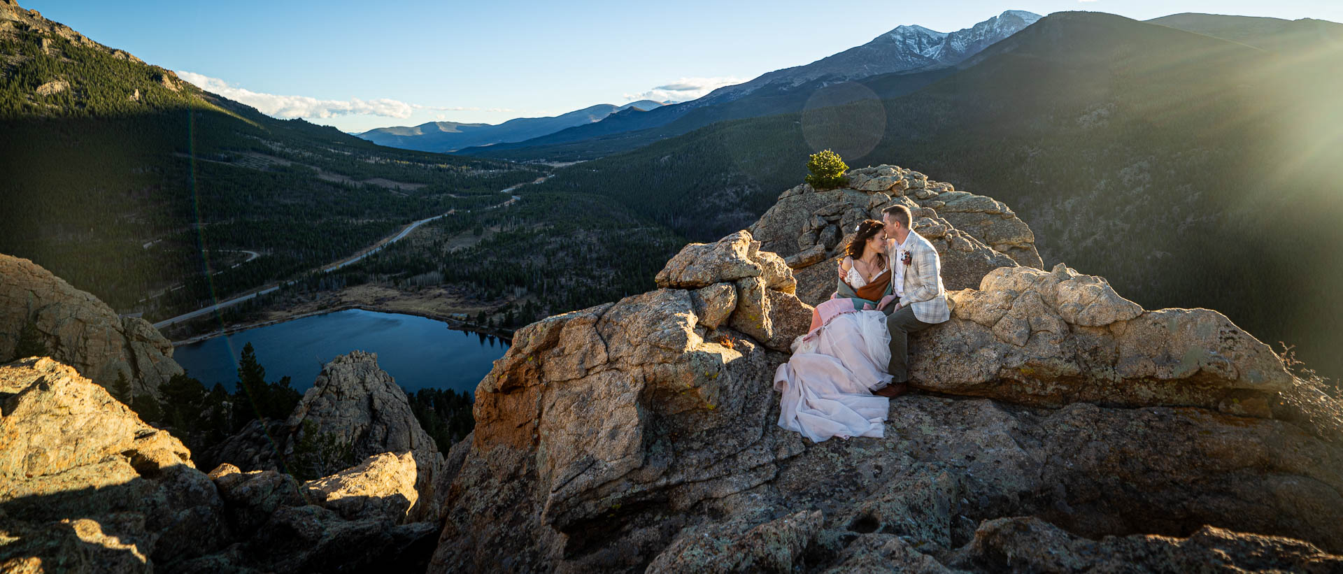 rocky mountain national park wedding photographer, Joe Pyle Photography, captures newlywed couple at Lily Lake, RMNP