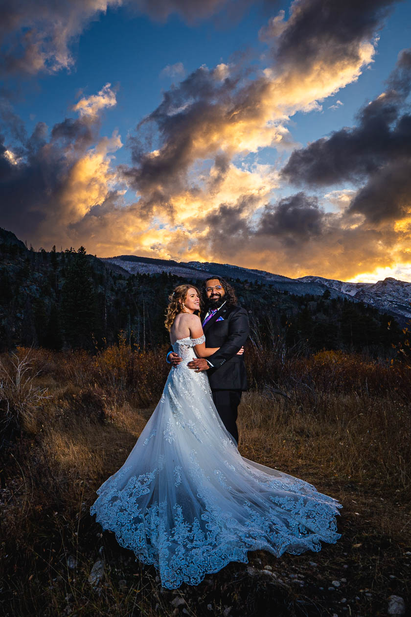 rocky mountain national park wedding photographer captures newlywed couple at Sprague Lake, RMNP