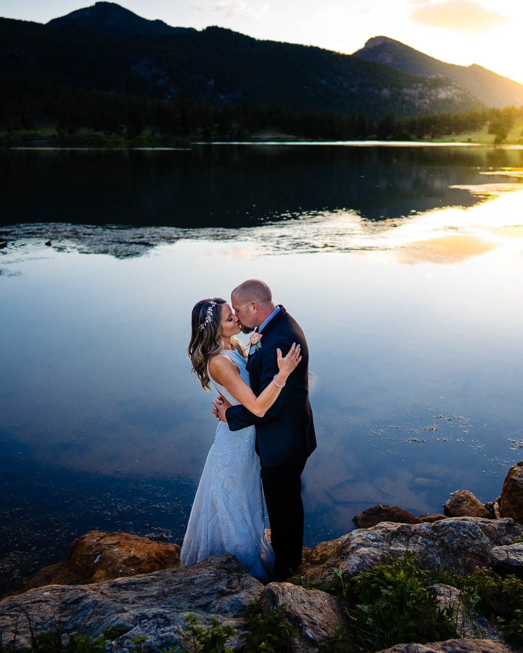 Estes Park wedding photographer team, Pyle Photography, captures couple at Lily Lake, in RMNP