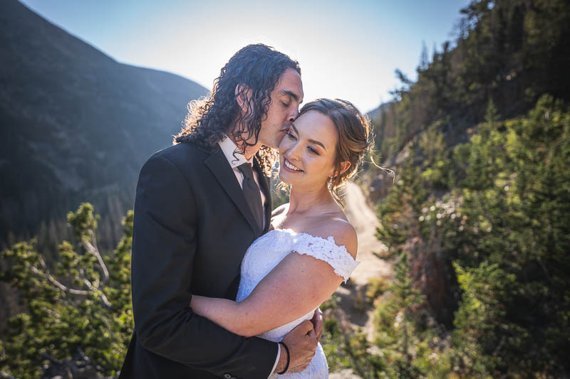 Estes Park elopement photographer captures couple embracing in RMNP