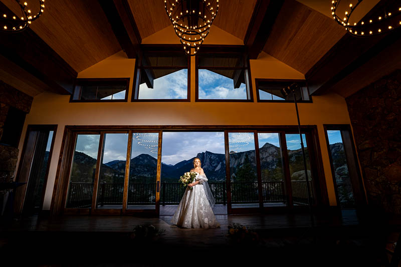 bride getting ready on her wedding day, by Estes Park wedding photographer