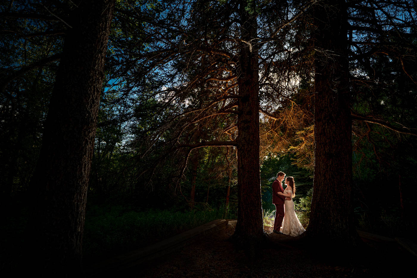 Estes Park wedding photographer, Joe Pyle Photography, captures evening wedding portrait in Estes Park, Colorado.